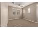 Bright bedroom featuring neutral walls and carpeting at 2772 S Betty St, Gilbert, AZ 85295