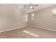 Well-lit bedroom with neutral walls and carpeting at 2772 S Betty St, Gilbert, AZ 85295