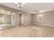 Bright dining room with wood-look tile floors and access to a backyard patio at 2772 S Betty St, Gilbert, AZ 85295