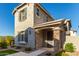 Two-story house with gray siding, stone accents, and a landscaped front yard at 2772 S Betty St, Gilbert, AZ 85295