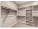 Large walk-in closet with shelves and hanging space at 2772 S Betty St, Gilbert, AZ 85295