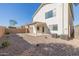 Backyard view showing the home's exterior and patio at 355 W Jersey Way, San Tan Valley, AZ 85143