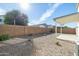Landscaped backyard with gravel and a covered patio at 355 W Jersey Way, San Tan Valley, AZ 85143