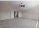 Spacious bedroom with carpeted floor and ceiling fan at 355 W Jersey Way, San Tan Valley, AZ 85143