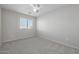 Simple bedroom with carpet flooring and window coverings at 355 W Jersey Way, San Tan Valley, AZ 85143