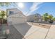 Two-story house with a two-car garage and desert landscaping at 355 W Jersey Way, San Tan Valley, AZ 85143