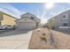 Two-story house with a two-car garage and desert landscaping at 355 W Jersey Way, San Tan Valley, AZ 85143