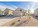 Two-story house with a two-car garage and desert landscaping at 355 W Jersey Way, San Tan Valley, AZ 85143