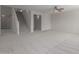 Open living room with staircase, carpet, and ceiling fan at 355 W Jersey Way, San Tan Valley, AZ 85143