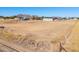 Wide shot of property showing a manufactured home and large lot at 50599 W Esch Trl, Maricopa, AZ 85139