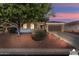 Single-story home with landscaped yard at 13766 W Junipero Dr, Sun City West, AZ 85375