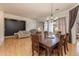 Formal dining room with dark wood table and chandelier at 3355 E Los Altos Rd, Gilbert, AZ 85297