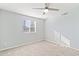 Well-lit bedroom with ceiling fan at 7132 N 63Rd Dr, Glendale, AZ 85301