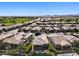 Aerial view showcasing the community's homes and golf course at 856 E Harmony Way, San Tan Valley, AZ 85140