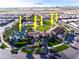 Arial view of The Algavre community amenities, including a pool, tennis courts, and clubhouse at 856 E Harmony Way, San Tan Valley, AZ 85140