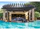 Swim-up bar and lounge area in resort-style pool at 856 E Harmony Way, San Tan Valley, AZ 85140