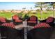 Relaxing patio with fire pit and comfortable seating at 856 E Harmony Way, San Tan Valley, AZ 85140