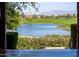 Scenic view of a lake, golf course, and mountains at 856 E Harmony Way, San Tan Valley, AZ 85140