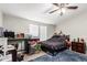 Spacious bedroom with a queen bed and workspace at 9431 E Coralbell Ave # 53, Mesa, AZ 85208