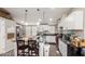 Modern kitchen with white cabinets and island at 9431 E Coralbell Ave # 53, Mesa, AZ 85208