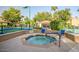 Community hot tub with surrounding patio furniture at 10101 N Arabian Trl # 1020, Scottsdale, AZ 85258