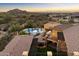 Aerial view showing pool, patio, and mountain views at 4256 N Desert Oasis Cir, Mesa, AZ 85207