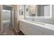 Modern bathroom with updated vanity and LED mirror at 17059 W Windermere Way, Surprise, AZ 85374