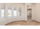 Room with curved windows and tile floor at 3611 N 197Th Ct, Buckeye, AZ 85396