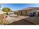 Large backyard with gravel landscaping, a patio, and plenty of space for gardening at 5014 S 26Th Ln, Phoenix, AZ 85041