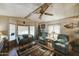 Cozy living room with wood floors, comfy seating and a Christmas tree at 9333 E University Dr # 177, Mesa, AZ 85207