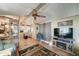 Bright living room with hardwood floors and a built-in entertainment center at 9333 E University Dr # 177, Mesa, AZ 85207
