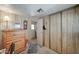 Bright bedroom with a dresser and access to the bathroom at 9333 E University Dr # 177, Mesa, AZ 85207