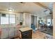 Functional kitchen with ample counter space and a breakfast bar at 9333 E University Dr # 177, Mesa, AZ 85207