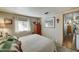 Relaxing bedroom with a queen-size bed and a view of the backyard at 9333 E University Dr # 177, Mesa, AZ 85207