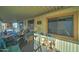 Relaxing covered patio with wicker furniture at 9333 E University Dr # 177, Mesa, AZ 85207