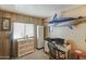 Home office featuring a desk, chair, and mounted marlin at 9333 E University Dr # 177, Mesa, AZ 85207