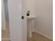 Clean bathroom with pedestal sink and modern fixtures at 24078 W Pecan Rd, Buckeye, AZ 85326