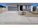 One story home with gray exterior and two car garage at 24078 W Pecan Rd, Buckeye, AZ 85326