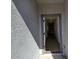 Open entryway with view into hallway and wood-look tile at 24078 W Pecan Rd, Buckeye, AZ 85326