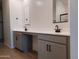 Modern bathroom with double vanity and gray cabinets at 24078 W Pecan Rd, Buckeye, AZ 85326