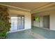 Covered patio with tiled flooring and sliding glass doors at 10861 W Venturi Dr, Sun City, AZ 85351