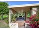 Covered patio with tile flooring and landscaping at 10861 W Venturi Dr, Sun City, AZ 85351