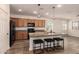 Modern kitchen with granite countertops and island at 10308 E Tahoe Ave, Mesa, AZ 85212