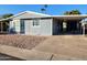 Ranch style home with carport and mature landscaping at 245 S 56Th St # 43, Mesa, AZ 85206