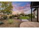 Desert landscape with fire pit and seating area at 17738 E Ord Ct, Rio Verde, AZ 85263