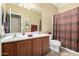 Clean bathroom with double sinks and shower at 18545 N Wilson St, Maricopa, AZ 85138