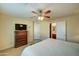 Bright bedroom with ensuite bathroom and ceiling fan at 2101 S Meridian Rd # 145, Apache Junction, AZ 85120