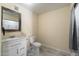 Clean bathroom with white vanity, toilet, and shower at 28480 N Bryce Trl, Queen Creek, AZ 85144