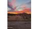 Scenic sunset view over desert landscape at 56636 W Nessa Ln, Maricopa, AZ 85139