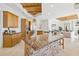 Island kitchen features granite countertops, stainless steel appliances, and a stone accent at 23461 N 80Th Way, Scottsdale, AZ 85255